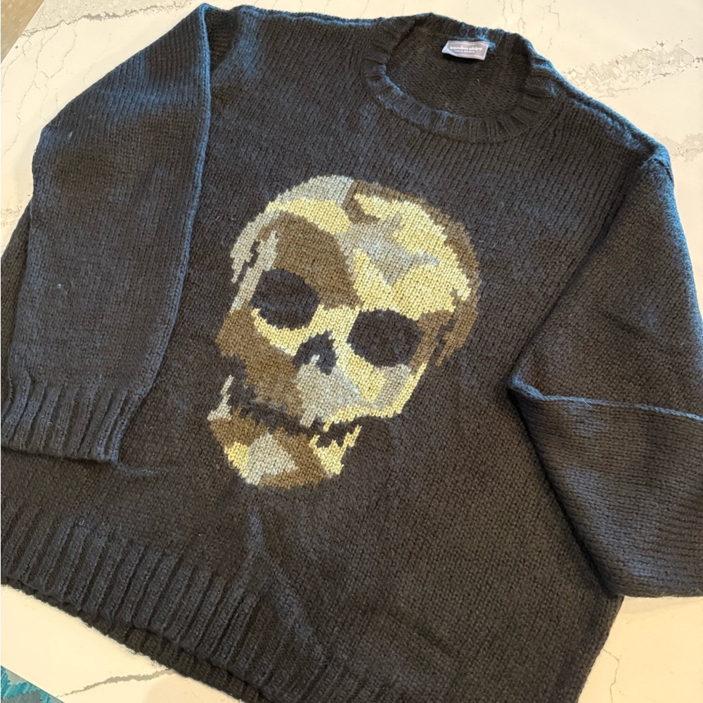 Wooden Ships black crewneck womens sweater with skull motif in green and gray